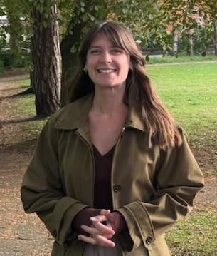 Charlotte smiling to camera in Milton Park, Alsager.
Charlotte is standing on behalf of the Green Party in the Alsager town council by-election on 5th June