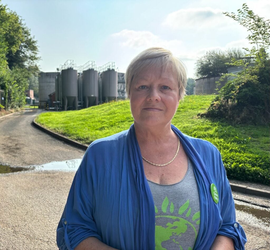 Green Party candidate Amanda Iremonger at Wilmslow Sewage Treatment Plant, calling on United Utilities to stop sewage pollution in the River Dean